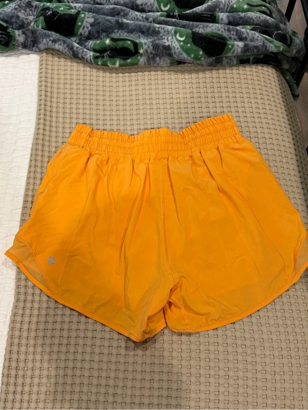 Lululemon Orange hotty hot 4” shorts size 6